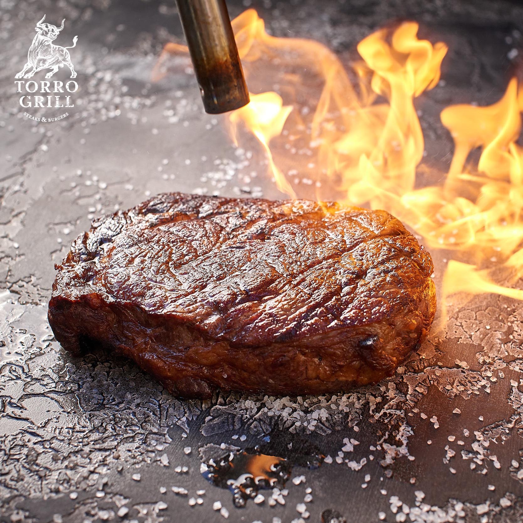 Стейк на огне в Torro Grill
